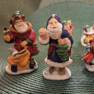 Bronson Collectibles Santa Figurines, Four Total